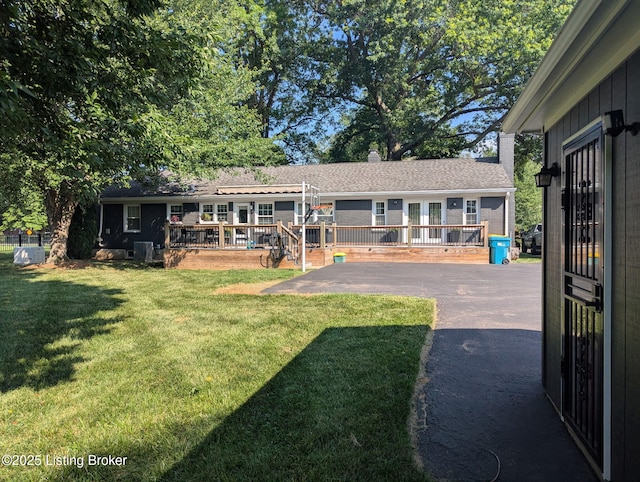 7206 Arrowwood Rd, Louisville, KY 40222 - rear view of property featuring a wooden deck, a yard, and a patio area
