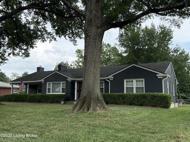 7206 Arrowwood Rd, Louisville, KY 40222 - ranch-style house with a front yard and a chimney