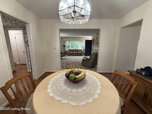 7206 Arrowwood Rd, Louisville, KY 40222 - dining space with a chandelier and carpet