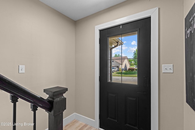 508 Auburn Oaks Dr, Louisville, KY 40214 - entryway featuring baseboards and light wood-style flooring