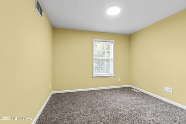 1601 Wilson Ave, Louisville, KY 40210 - empty room featuring carpet flooring and baseboards