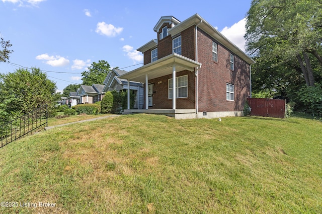 1601 Wilson Ave, Louisville, KY 40210 - view of front of home featuring brick siding and a porch