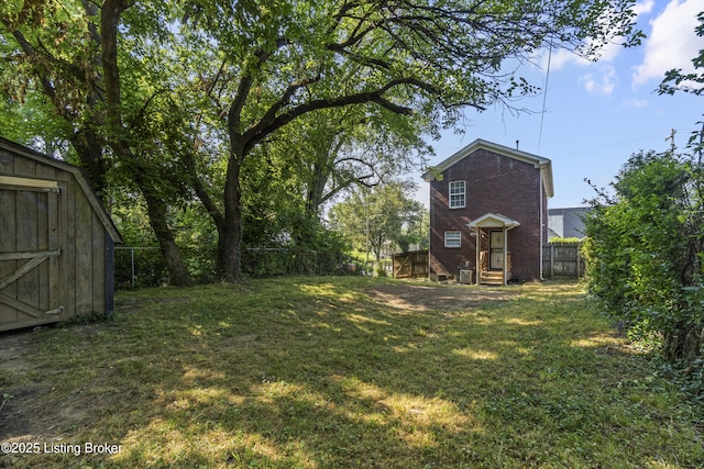 1601 Wilson Ave, Louisville, KY 40210 - fenced backyard featuring a storage shed