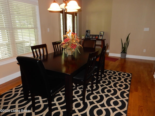 193 Pare Ct, Shepherdsville, KY 40165 - dining room featuring wood finished floors, healthy amount of natural light, and a chandelier