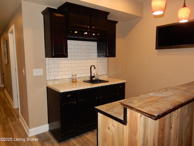 193 Pare Ct, Shepherdsville, KY 40165 - kitchen featuring light wood-style flooring, tasteful backsplash, and light countertops