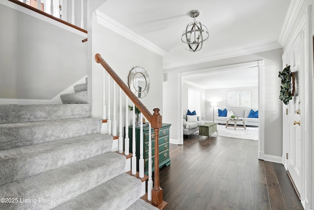 12512 Kirkham Rd, Louisville, KY 40299 - entryway featuring dark wood-style flooring, stairs, a chandelier, and crown molding