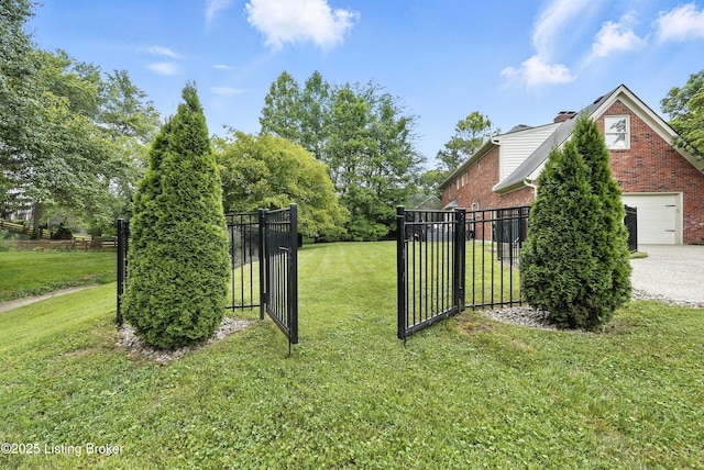 12512 Kirkham Rd, Louisville, KY 40299 - view of yard with a gate and a garage