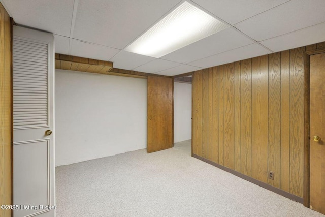 1607 Belmar Dr, Louisville, KY 40213 - finished basement with a drop ceiling, carpet, and wooden walls