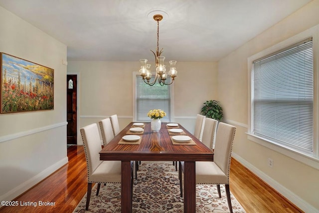 1607 Belmar Dr, Louisville, KY 40213 - dining space featuring a chandelier and light wood-style floors