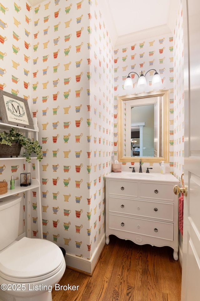 9906 Glen Vista Dr, Prospect, KY 40059 - half bath featuring wallpapered walls, wood finished floors, and vanity