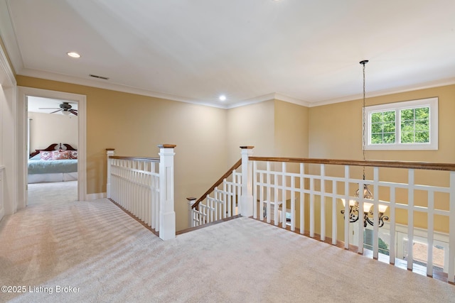 9906 Glen Vista Dr, Prospect, KY 40059 - hallway with an upstairs landing, carpet flooring, crown molding, a chandelier, and recessed lighting