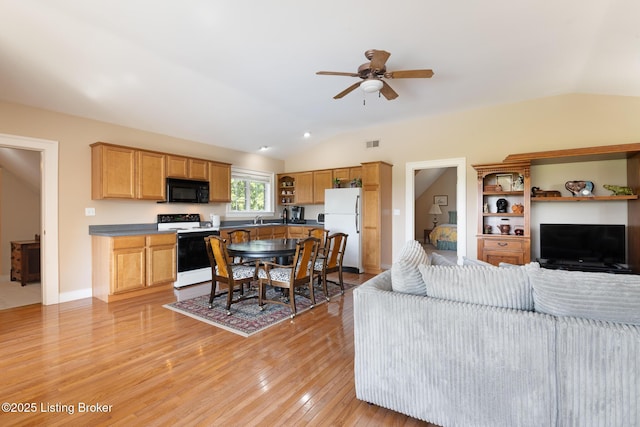 9906 Glen Vista Dr, Prospect, KY 40059 - living room featuring vaulted ceiling, a ceiling fan, and light wood-style flooring