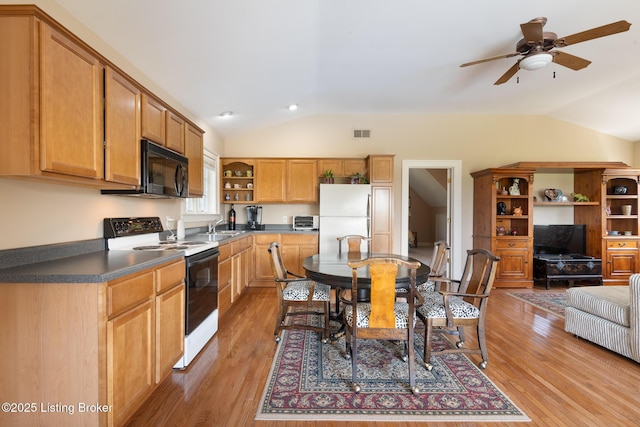 9906 Glen Vista Dr, Prospect, KY 40059 - kitchen with electric stove, vaulted ceiling, freestanding refrigerator, open shelves, and black microwave