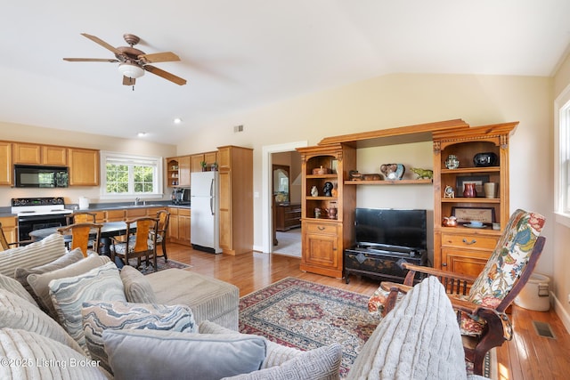 9906 Glen Vista Dr, Prospect, KY 40059 - living area featuring lofted ceiling, a ceiling fan, and light wood finished floors