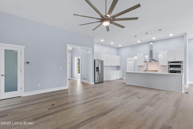 7103 Star Barn Ln, Crestwood, KY 40014 - unfurnished living room with ceiling fan, light wood finished floors, and recessed lighting