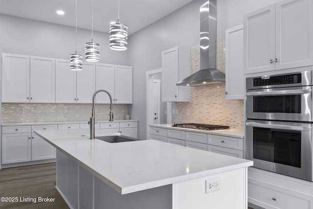 7103 Star Barn Ln, Crestwood, KY 40014 - kitchen featuring appliances with stainless steel finishes, wall chimney exhaust hood, white cabinets, backsplash, and recessed lighting