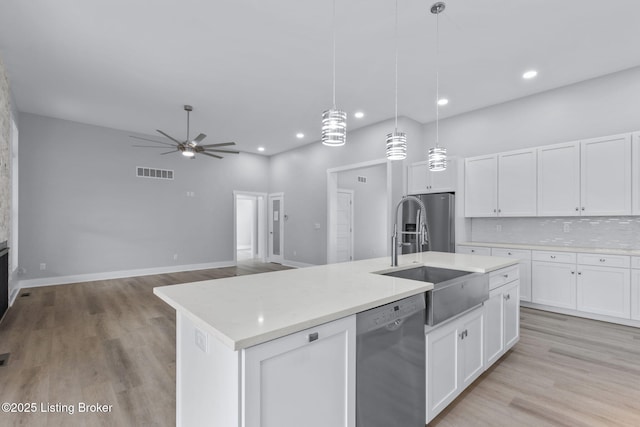 7103 Star Barn Ln, Crestwood, KY 40014 - kitchen featuring stainless steel appliances, ceiling fan, recessed lighting, backsplash, and white cabinets
