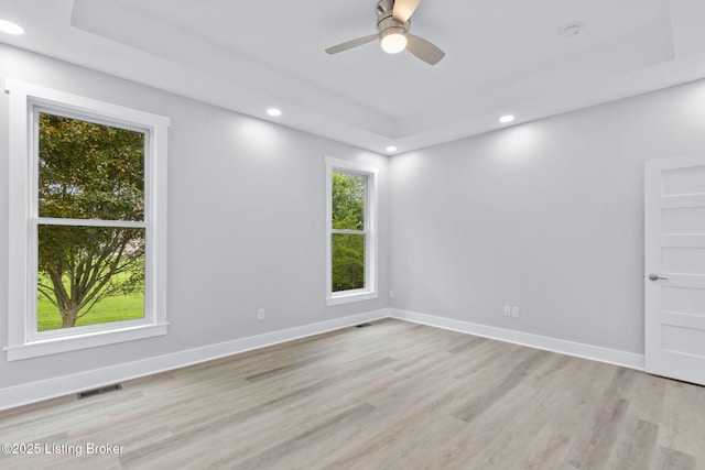 7103 Star Barn Ln, Crestwood, KY 40014 - empty room with a ceiling fan, recessed lighting, light wood-type flooring, and a raised ceiling