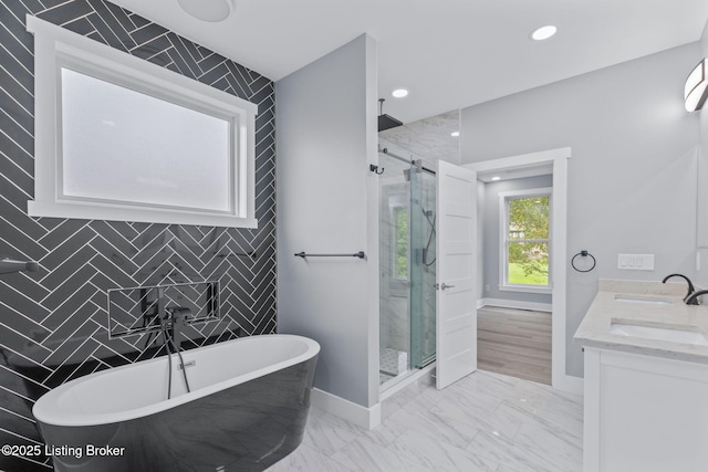 7103 Star Barn Ln, Crestwood, KY 40014 - bathroom featuring marble finish flooring, a shower stall, a soaking tub, recessed lighting, and double vanity