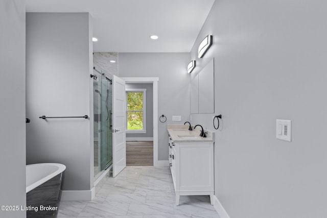 7103 Star Barn Ln, Crestwood, KY 40014 - bathroom with marble look tile flooring, vanity, a soaking tub, a shower stall, and recessed lighting