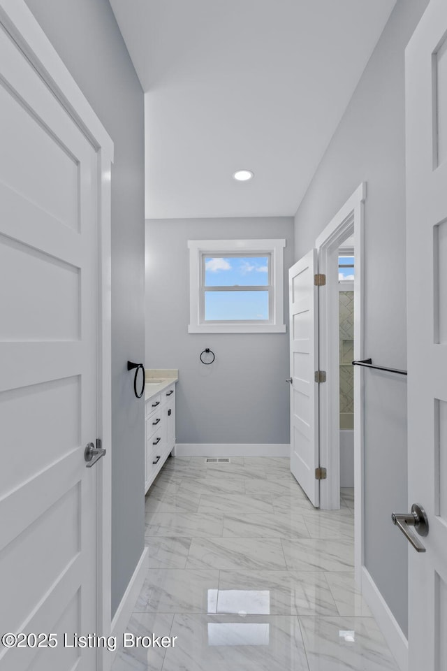7103 Star Barn Ln, Crestwood, KY 40014 - bathroom with vanity, marble look tiles, and recessed lighting