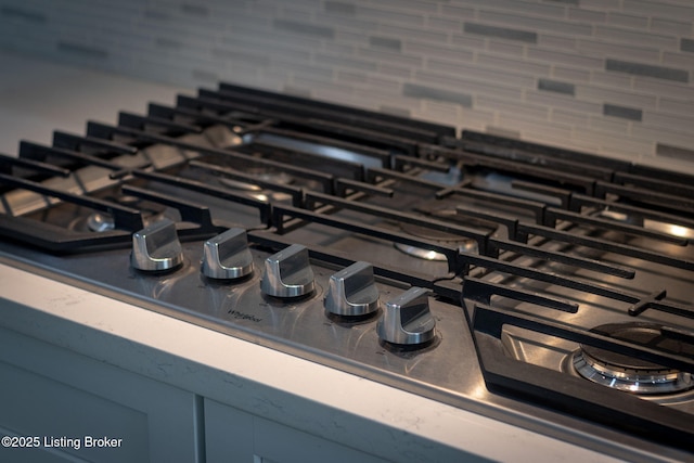 7103 Star Barn Ln, Crestwood, KY 40014 - detailed view of stainless steel gas cooktop and decorative backsplash