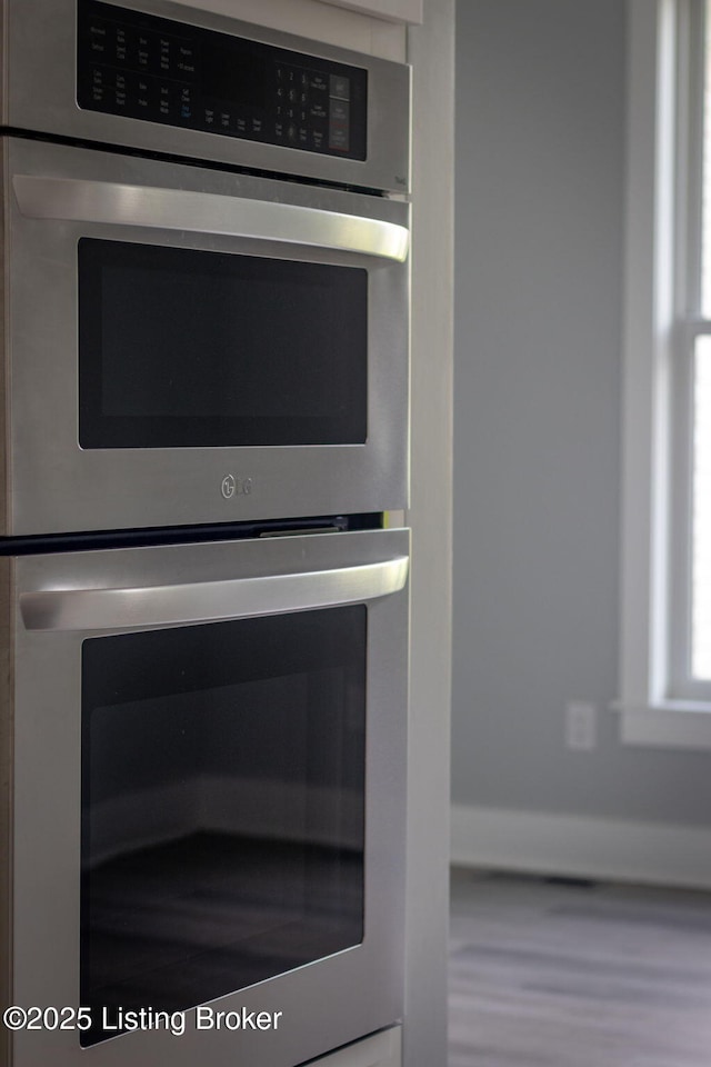 7103 Star Barn Ln, Crestwood, KY 40014 - kitchen view of stainless steel double oven and wood finished floors