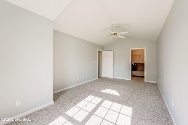 6708 Island Pointe Pl, Louisville, KY 40258 - unfurnished bedroom featuring carpet flooring, vaulted ceiling, a walk in closet, a closet, and a ceiling fan