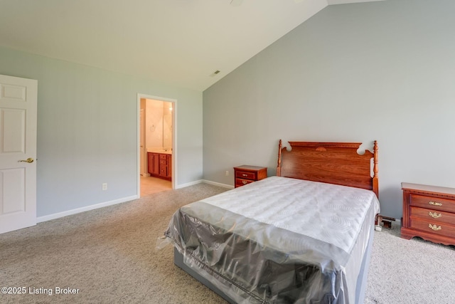 6708 Island Pointe Pl, Louisville, KY 40258 - bedroom featuring light carpet, lofted ceiling, and ensuite bath