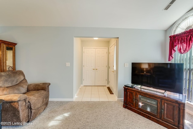 6708 Island Pointe Pl, Louisville, KY 40258 - living room with light colored carpet and light tile patterned flooring