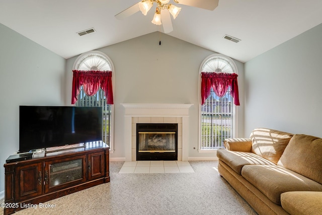 6708 Island Pointe Pl, Louisville, KY 40258 - living room with a ceiling fan, carpet, a tile fireplace, and lofted ceiling