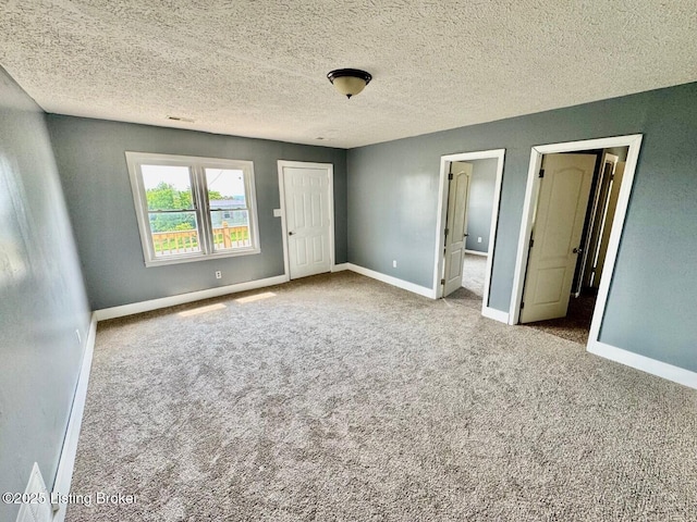 6234 Mackville Rd, Springfield, KY 40069 - unfurnished bedroom featuring carpet flooring, a closet, and a textured ceiling