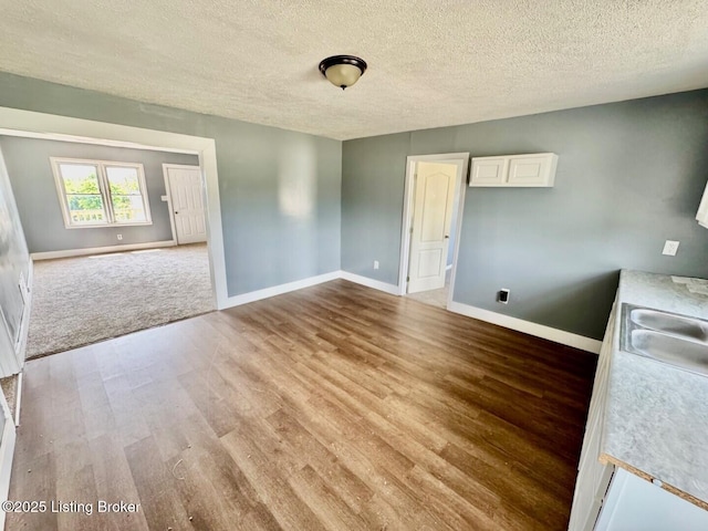 6234 Mackville Rd, Springfield, KY 40069 - unfurnished room featuring wood finished floors and a textured ceiling