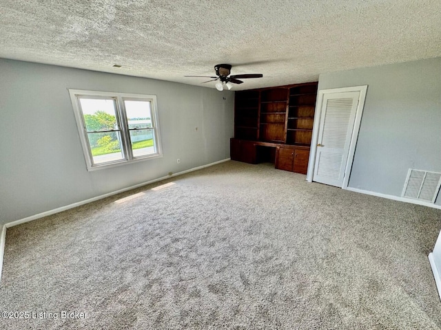 6234 Mackville Rd, Springfield, KY 40069 - unfurnished bedroom with carpet flooring, a ceiling fan, and a textured ceiling