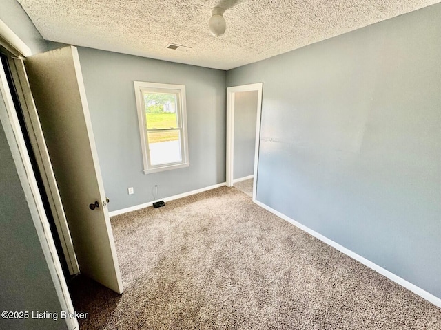 6234 Mackville Rd, Springfield, KY 40069 - carpeted empty room featuring baseboards and a textured ceiling