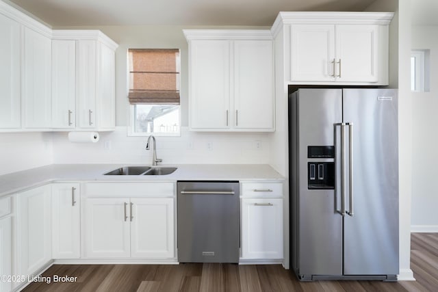 3611 Fordham Pk Dr, Louisville, KY 40245 - kitchen featuring appliances with stainless steel finishes, white cabinets, and dark wood-style floors