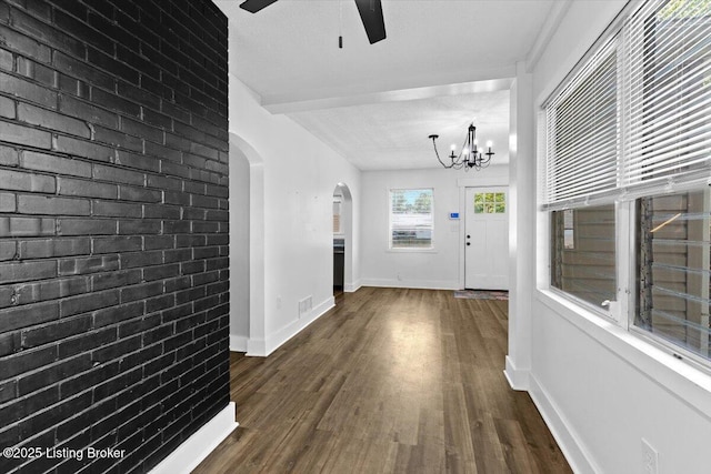428 Pennsylvania Ave, Elizabethtown, KY 42701 - entrance foyer featuring ceiling fan, arched walkways, dark wood-style floors, a chandelier, and beamed ceiling