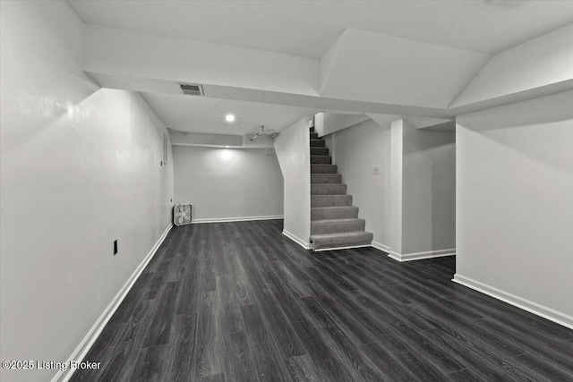 428 Pennsylvania Ave, Elizabethtown, KY 42701 - finished basement with dark wood-type flooring and stairs
