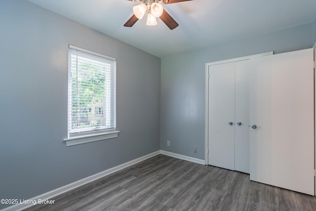 4116 Stoneview Dr Unit 1, Louisville, KY 40207 - unfurnished bedroom featuring multiple windows, wood finished floors, a closet, and ceiling fan