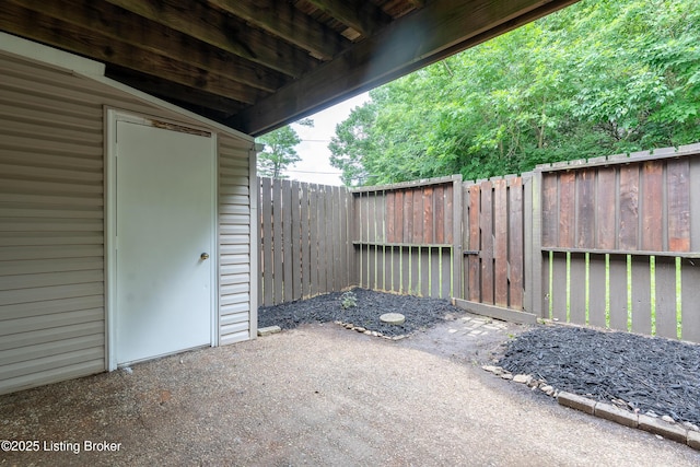 4116 Stoneview Dr Unit 1, Louisville, KY 40207 - fenced backyard with a patio area and an outbuilding