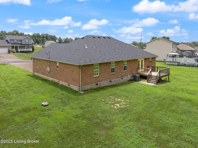 223 Rebecca Ann Ct, Elizabethtown, KY 42701 - back of house with crawl space, roof with shingles, brick siding, a deck, and a yard