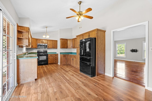 360 Van Buren Rd, Mount Eden, KY 40046 - kitchen featuring black appliances, open shelves, light wood-style floors, brown cabinetry, and lofted ceiling