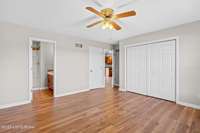 360 Van Buren Rd, Mount Eden, KY 40046 - unfurnished bedroom featuring light wood-type flooring, a closet, ensuite bath, and a ceiling fan