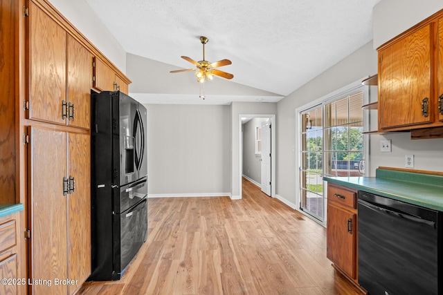 360 Van Buren Rd, Mount Eden, KY 40046 - kitchen with black appliances, vaulted ceiling, ceiling fan, light wood-style floors, and brown cabinets