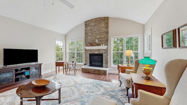 734 Dehart Ln, Louisville, KY 40243 - living area featuring lofted ceiling, wood finished floors, healthy amount of natural light, a fireplace, and ceiling fan