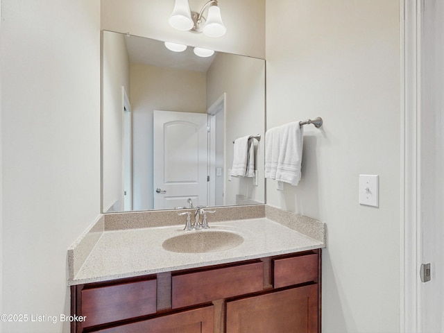 734 Dehart Ln, Louisville, KY 40243 - bathroom featuring vanity and a chandelier