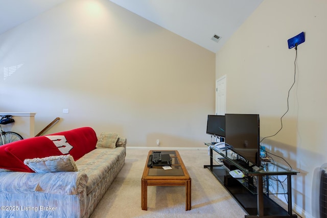 344 S Dorsey Ln Unit 344, Louisville, KY 40223 - carpeted living area with high vaulted ceiling and baseboards