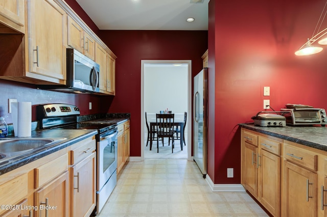 344 S Dorsey Ln Unit 344, Louisville, KY 40223 - kitchen with stainless steel appliances, light flooring, dark countertops, and recessed lighting