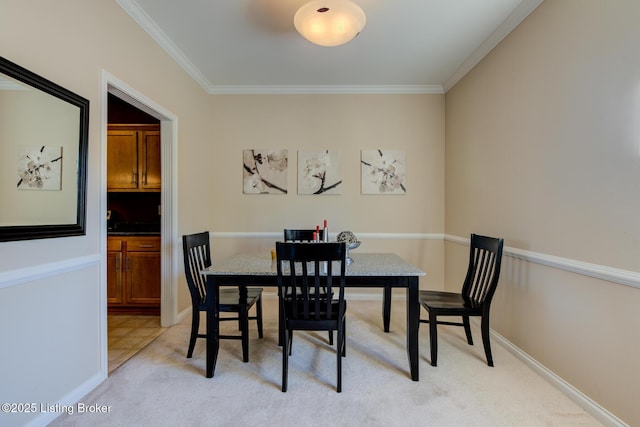 344 S Dorsey Ln Unit 344, Louisville, KY 40223 - dining room with light colored carpet and ornamental molding
