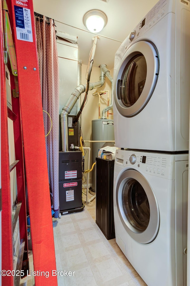 344 S Dorsey Ln Unit 344, Louisville, KY 40223 - washroom featuring stacked washer and clothes dryer, water heater, and light floors